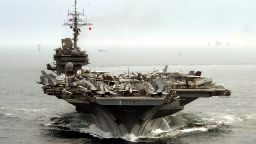 Jet aircraft line the flight deck of the aircraft carrier USS Kitty Hawk as it plys the waters of the Gulf, Friday March 7, 2003. The Kitty Hawk is one of five carrier battle groups in the area patroling the no-fly zones in Iraq and for possible airstrikes on Iraq in the event of war. 