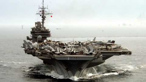 Jet aircraft line the flight deck of the aircraft carrier USS Kitty Hawk as it plys the waters of the Gulf, Friday March 7, 2003. 