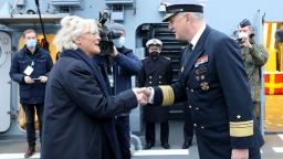 German Defence Minister Christine Lambrecht is welcomed by vice-admiral Kay-Achim Schoenbach onboard the corvette "Oldenburg" during a visit of the naval base Warnemuende, on December 17, 2021. (Photo by Bernd Wüstneck / POOL / AFP) (Photo by BERND WUSTNECK/POOL/AFP via Getty Images)
