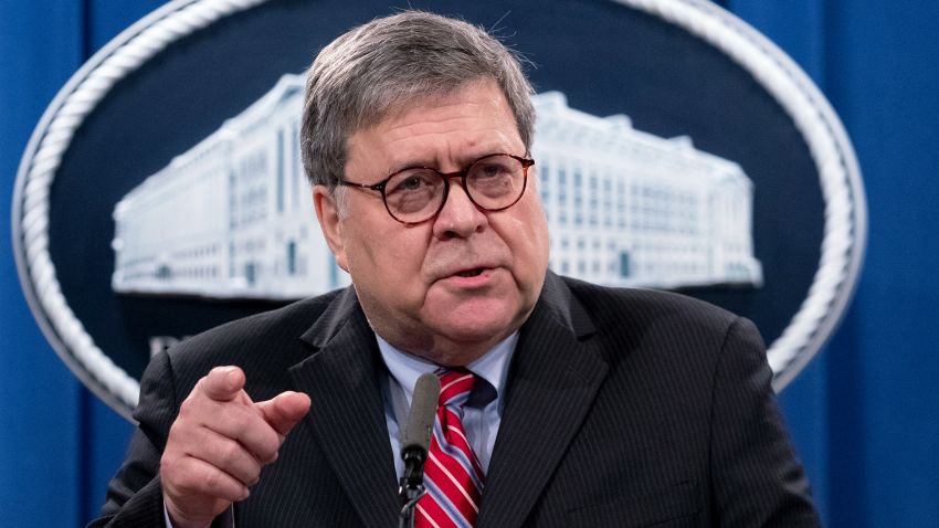 US Attorney General Bill Barr holds a news conference to provide an update on the investigation of the terrorist bombing of Pan Am flight 103 on the 32nd anniversary of the attack, at the Department of Justice December 21, 2020 in Washington, DC.