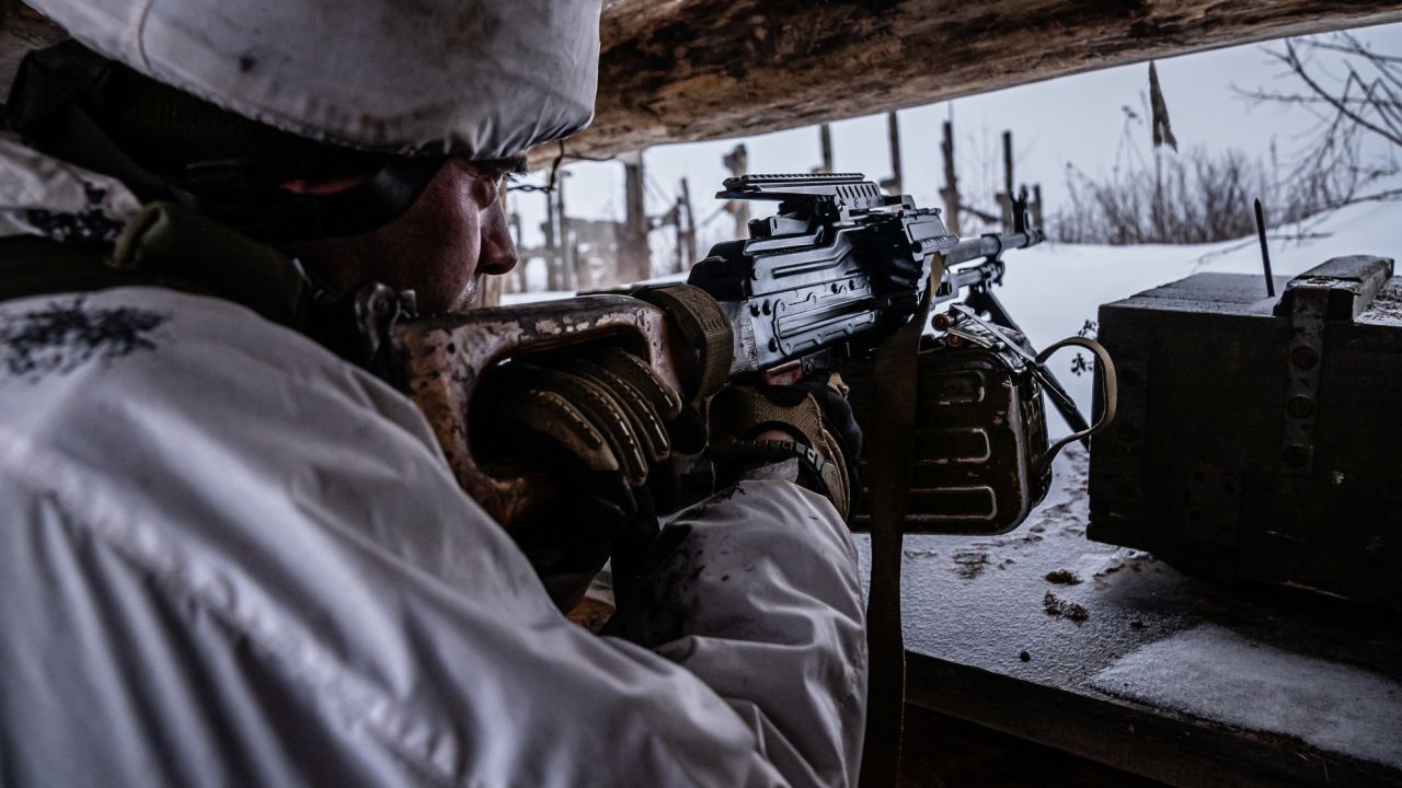 A Ukrainian soldier mans a gunner position in a front-line trench in Avdiivka, Ukraine.