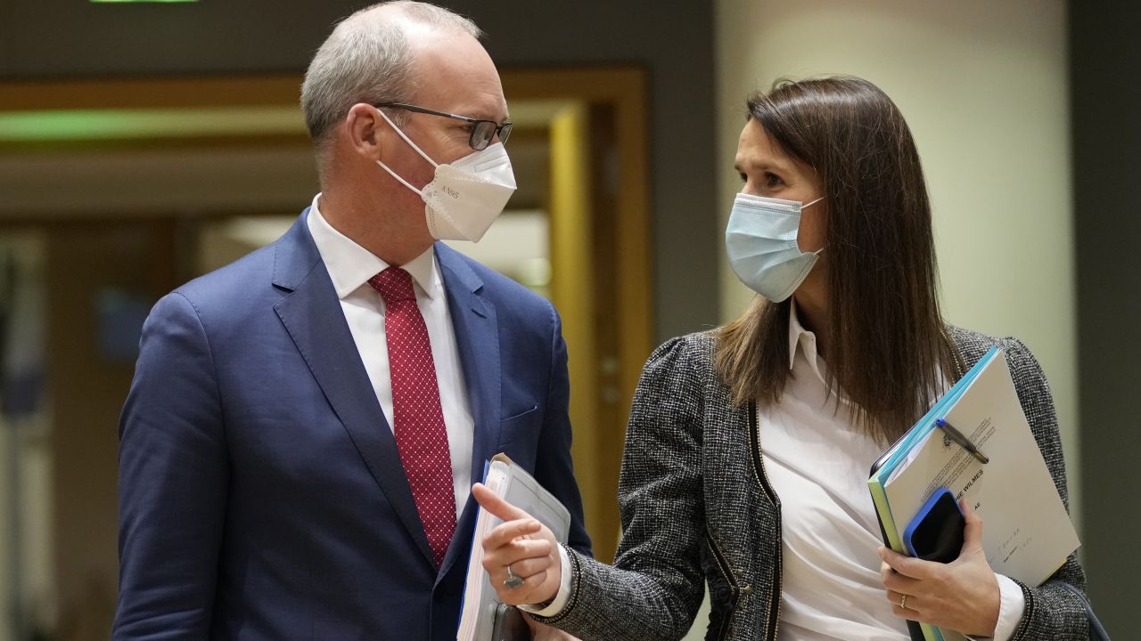 Ireland's Foreign Minister Simon Coveney, left, speaks with Belgium's Foreign Minister Sophie Wilmes during a meeting of EU foreign ministers at the European Council building in Brussels, on January 24.