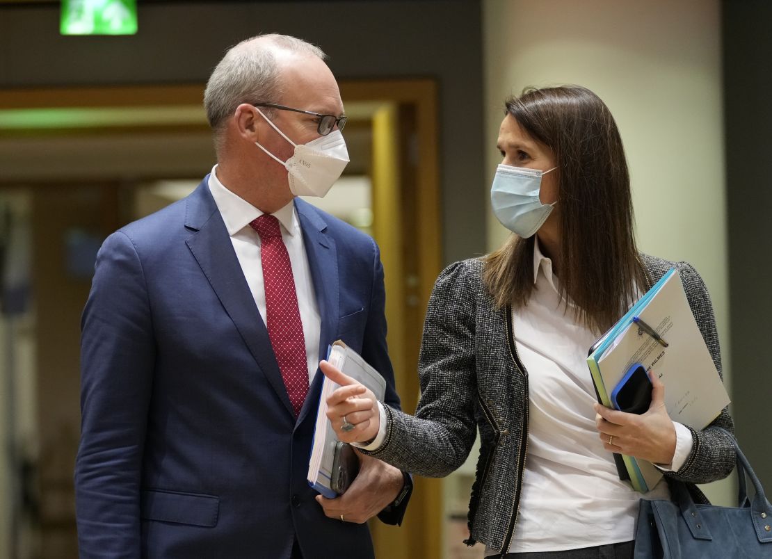 Ireland's Foreign Minister Simon Coveney, left, speaks with Belgium's Foreign Minister Sophie Wilmes during a meeting of EU foreign ministers at the European Council building in Brussels, on January 24.