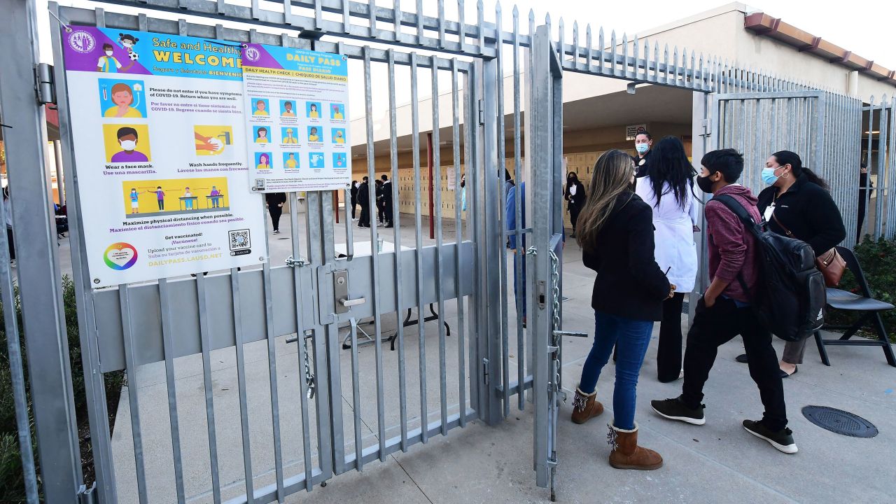 Students return to campus at Olive Vista Middle School on the first day back following the winter break amid a dramatic surge in Covid-19 cases across Los Angeles County on January 11, 2022 in Sylmar, California.