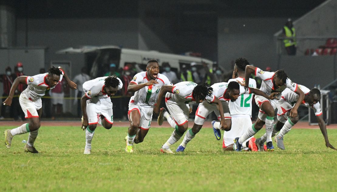 Burkina Faso's players celebrate beating Gabon on penalties.