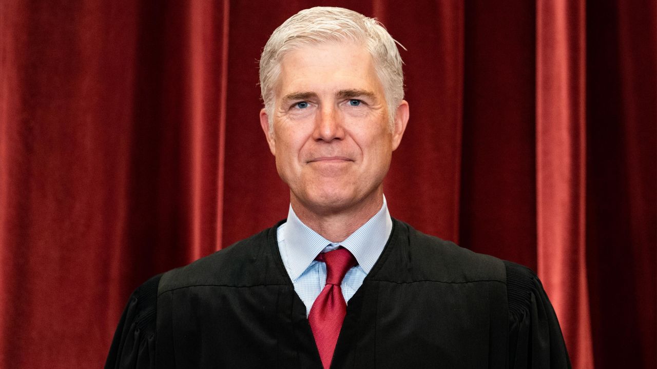WASHINGTON, DC - APRIL 23: Associate Justice Neil Gorsuch stands during a group photo of the Justices at the Supreme Court in Washington, DC on April 23, 2021. (Photo by Erin Schaff-Pool/Getty Images)