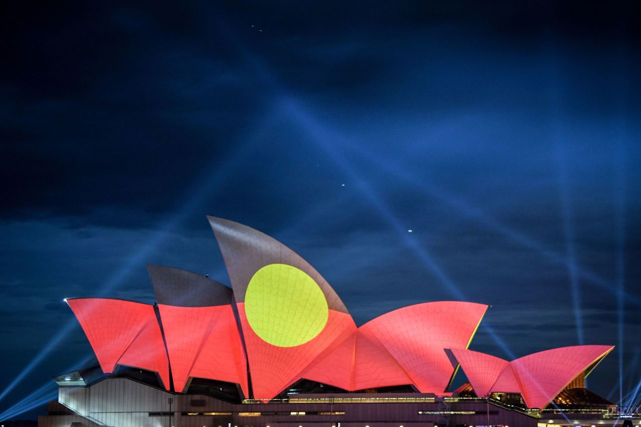 The Aboriginal flag projected onto Sydney Opera House on Australia Day in 2021.