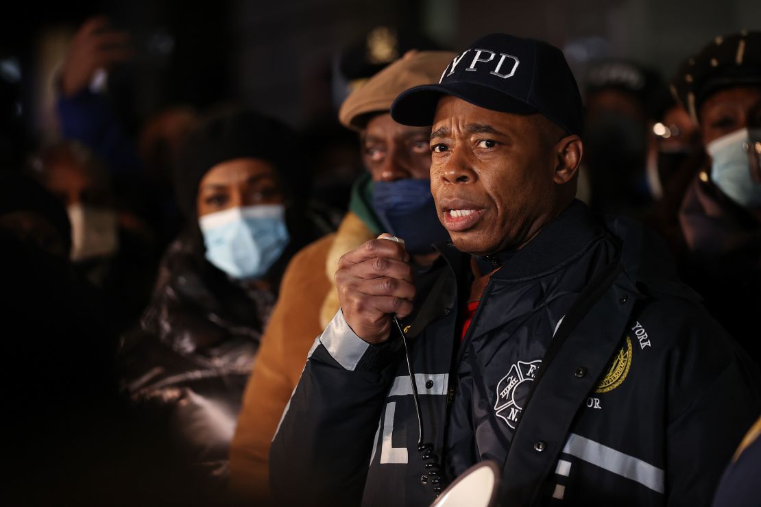 Mayor Eric Adams speaks to hundreds of police and fire officers at a vigil on January 22, 2022, for two officers shot in Harlem