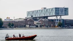 The Unilever headquarter building seen by the Nieuwe Maas River as a boat pass by in Rotterdam on August 11, 2020. 