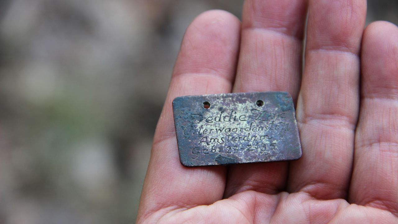 Deddie Zak's badly burnt tag was found in one of the crematoria of the extermination camp.