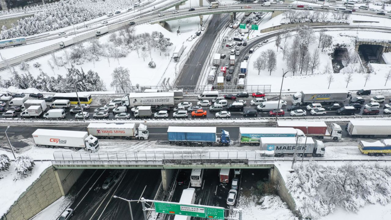 Vehicles stuck on a snow-covered road after heavy snowfall hit Istanbul.