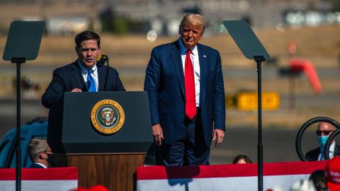 Doug Ducey, governor of Arizona, speaks during a Make America Great Again rally with then President Donald Trump, right, in Prescott, Arizona, in October 2020.