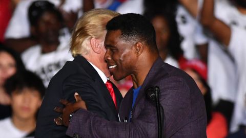 Republican Senate candidate Herschel Walker and former president Donald Trump hold a Save America rally in Perry, GA, United States on September 25, 2021.