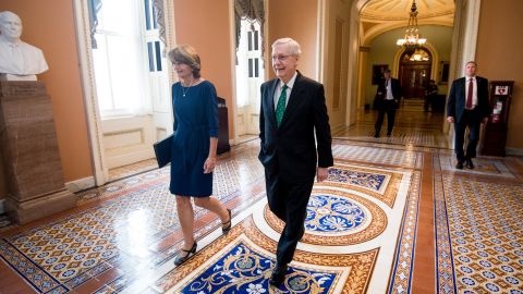 Sen. Lisa Murkowski and McConnell walk to McConnell's office in the Capitol after a vote in October 2018.