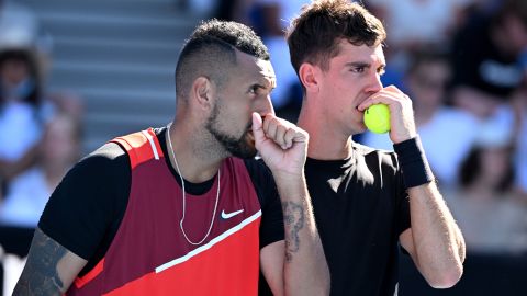 Nick Kyrgios (left) and Thanasi Kokkinakis of Australia during their men's doubles quarterfinal match against Tim Puetz of Germany and Michael Venus of New Zealand on day 9 of the Australian Open, at Melbourne Park, in Melbourne, Tuesday, January 25, 2022. 