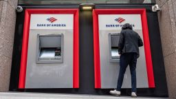 A customer uses an automated teller machine (ATM) at a Bank of America bank branch in San Francisco, California, U.S., on Monday, July 12, 2021