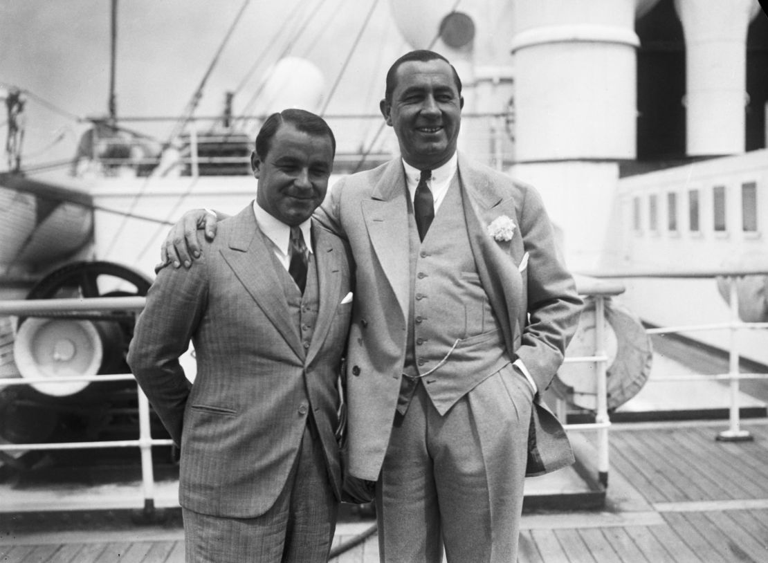 Hagen (right) stands with Gene Sarazen (left) on board the RMS Aquitania on arrrival in Southampton, June 21, 1933.