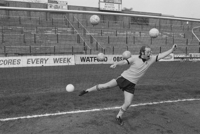 John is overwhelmed by multiple shots on goal while playing around at Watford's stadium in 1974.