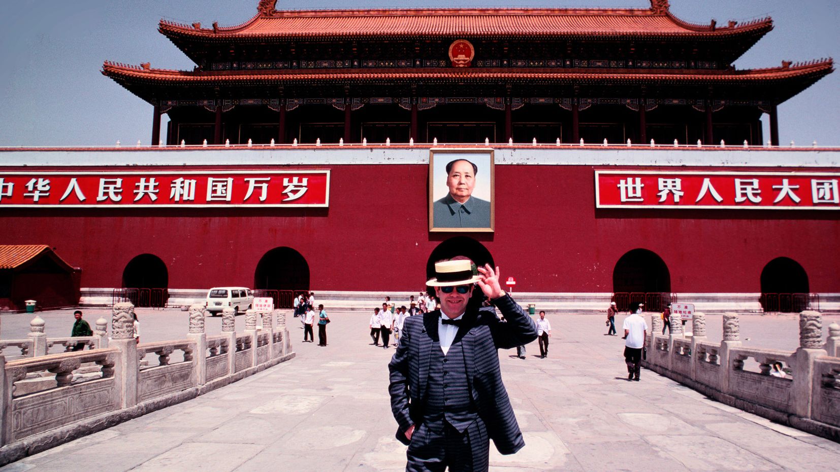 John stands in Tiananmen Square while touring Beijing in 1983.