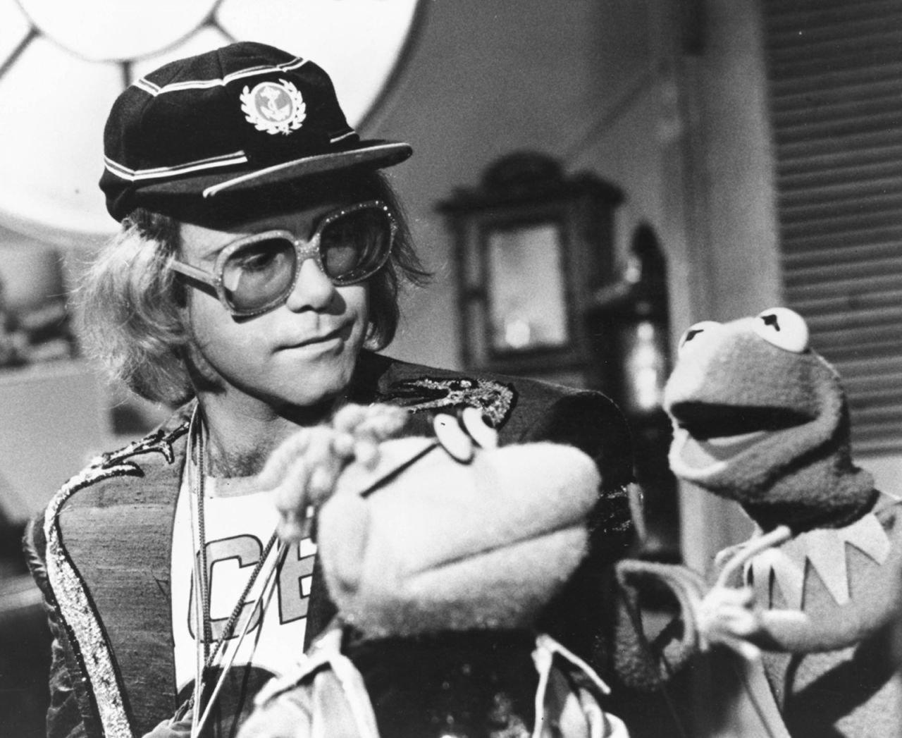 John appears on "The Muppet Show" in 1978. He performed four of his songs on the episode.