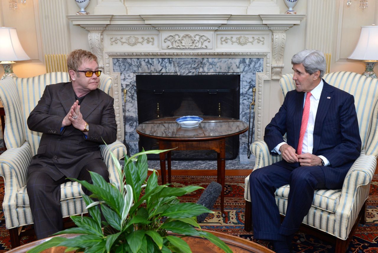 John meets with US Secretary of State John Kerry in 2014. The two talked about John's foundation as well as PEPFAR, the President's Emergency Plan for AIDS Relief.
