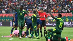 Players react after a collision during the Africa Cup of Nations (CAN) 2021 round of 16 football match between Senegal and Cape Verde at Stade de Kouekong in Bafoussam on January 25, 2022. (Photo by Pius Utomi EKPEI / AFP) (Photo by PIUS UTOMI EKPEI/AFP via Getty Images)