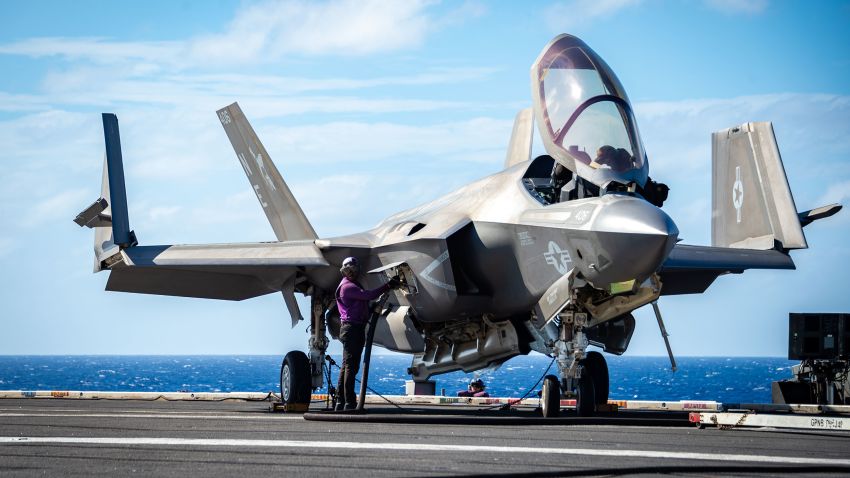 220119-N-EE352-1075 PHILIPPINE SEA (Jan. 19, 2022) A Sailor fuels an F-35C Lightning II, assigned to the 