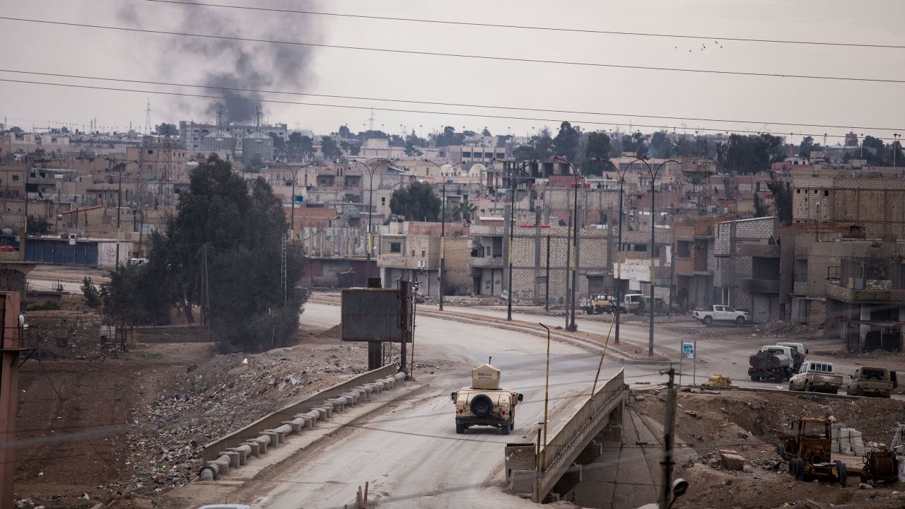 A Humvee patrols in Hasakah, northeast Syria, on Monday amid ongoing clashes between US-backed Kurdish forces and ISIS.