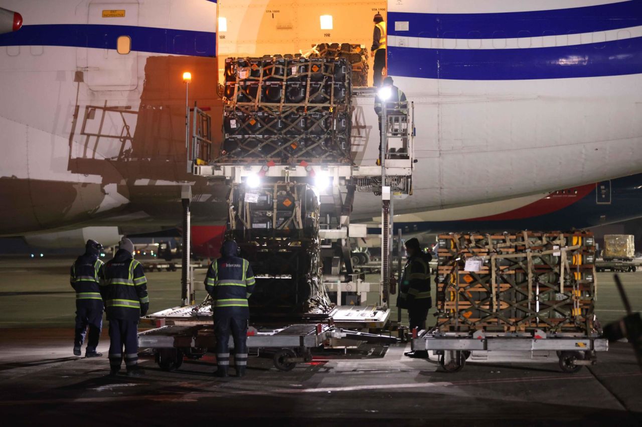 Ground crew unload weapons and other military hardware delivered by the United States at Boryspil Airport near Kyiv on January 25 in Boryspil, Ukraine.