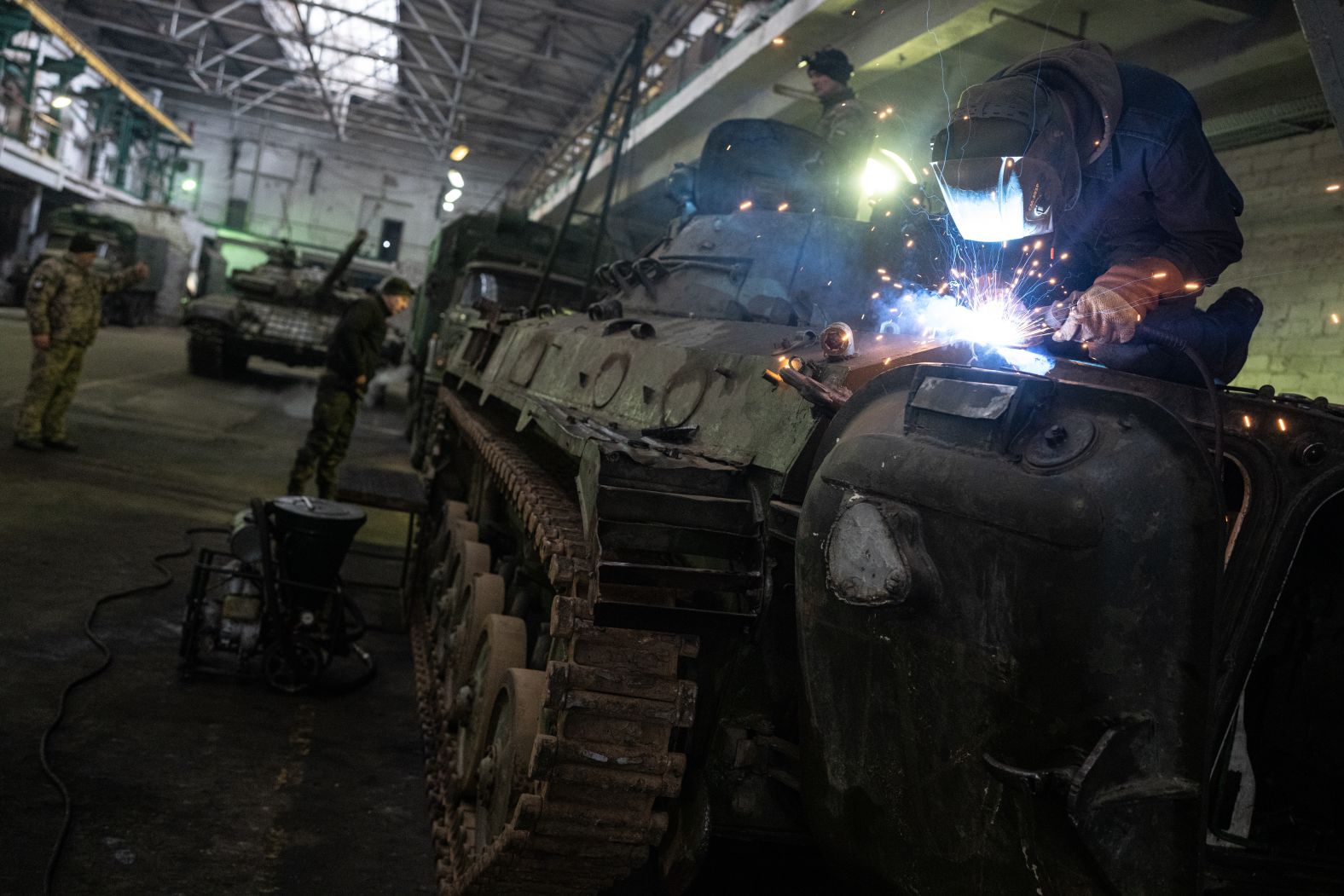 Ukrainian servicemen of the Mechanized Brigade service vehicles at an undisclosed location in the Luhansk Region, Ukraine, on January 25.