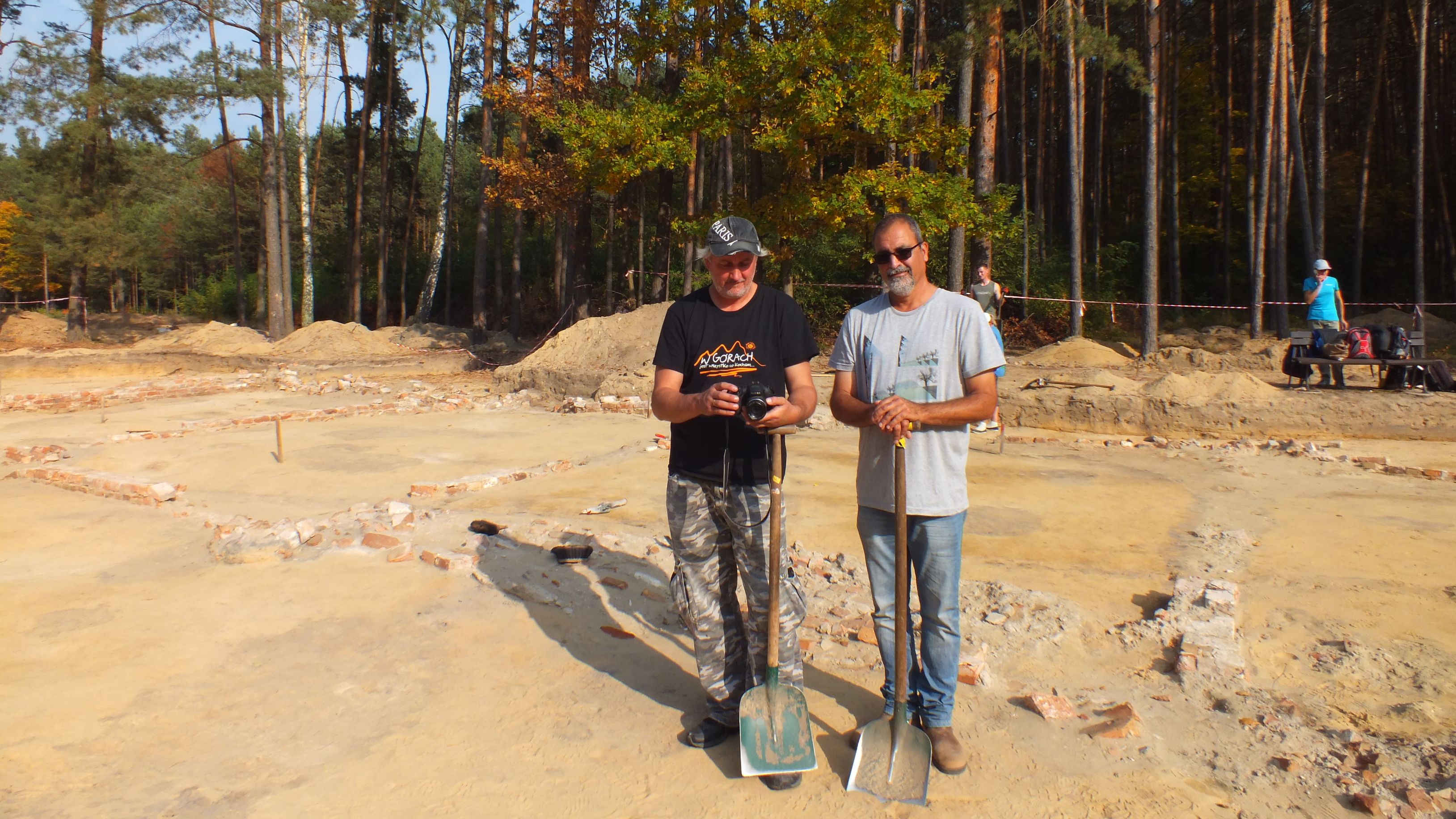 Polish archaeologist Wojciech Mazurek (L) alongside his Israeli colleague Yoram Haimi (R) at Sobibor.