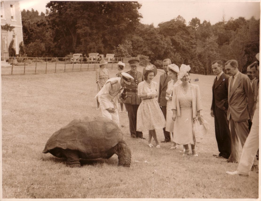 Jonathan has seen governors and royalty come and go in his long lifetime. Here he is with the Queen and her family as a young woman.