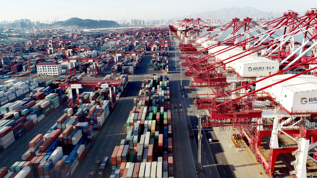 Aerial view of shipping containers sitting stacked at Asia's first fully automated container terminal of Qingdao Port on January 14, 2022 in Qingdao, Shandong Province of China. 