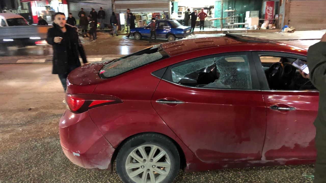 Images provided to CNN by local residents show damaged cars in the Palestinian town of Huwwara on Monday.