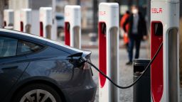 Tesla vehicles are parked at fast-charging stations in Schöneberg, Berlin on January 22.
