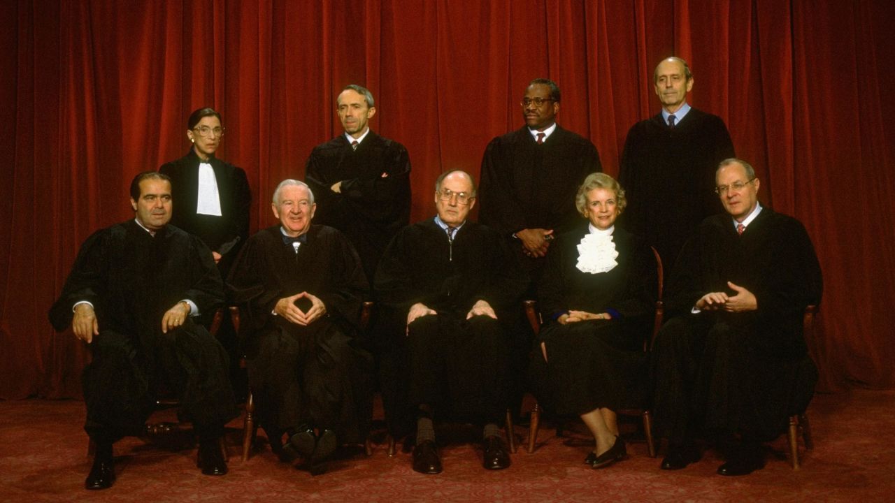 Supreme Court Justices (L-R) Scalia, Ginsburg, Stevens, Souter, Chief Rehnquist, Thomas, O'Connor, Breyer and Kennedy in formal portrait in 1994.
