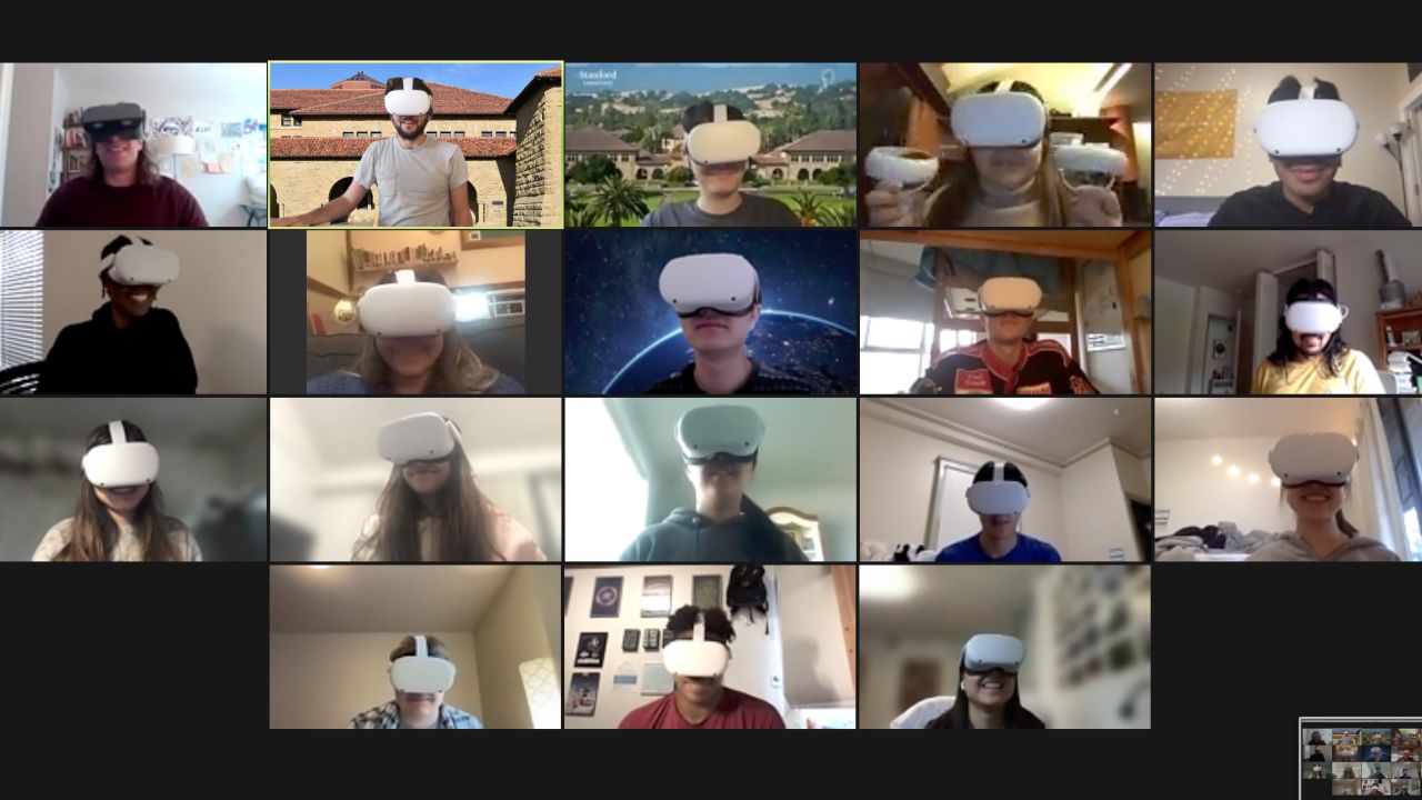 A screenshot of Stanford students participating in a discussion on Zoom while working together collaboratively as avatars in VR.