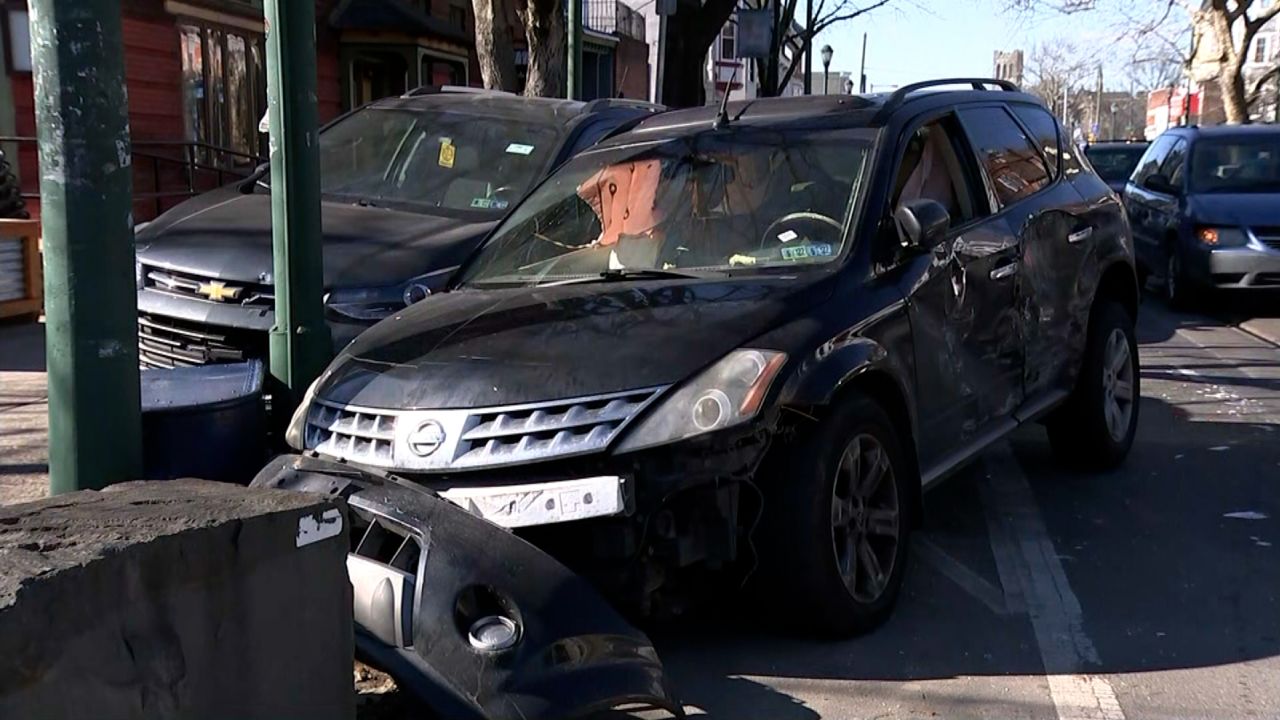 A Philadelphia police officer was dragged by a vehicle for five blocks as a driver attempted to flee, police said, before the vehicle crashed. 