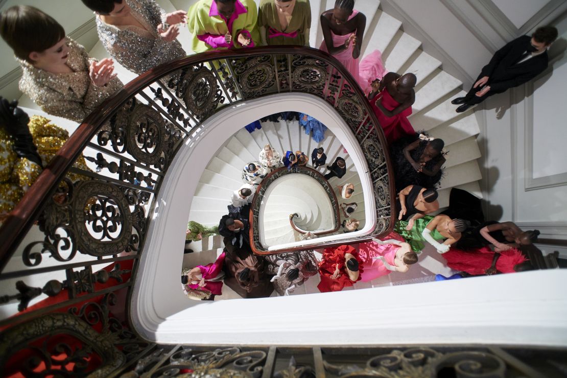 Models on the spiral stairs at Valentino's Paris salons.