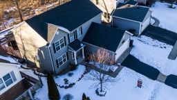 An aerial photo made with a drone shows a house for sale in Round Lake Heights, Illinois, USA, 21 January 2021. 