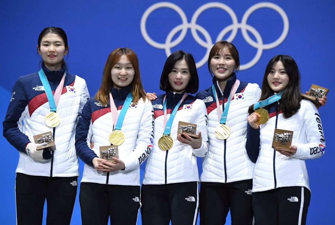 South Korea's gold medalists Shim Suk-hee, Choi Minjeong, Kim Yejin, Kim Alang and Lee Yubin pose on the podium during the medal ceremony for the short track Women's 3,000m relay at the Pyeongchang 2018 Winter Olympic Games.