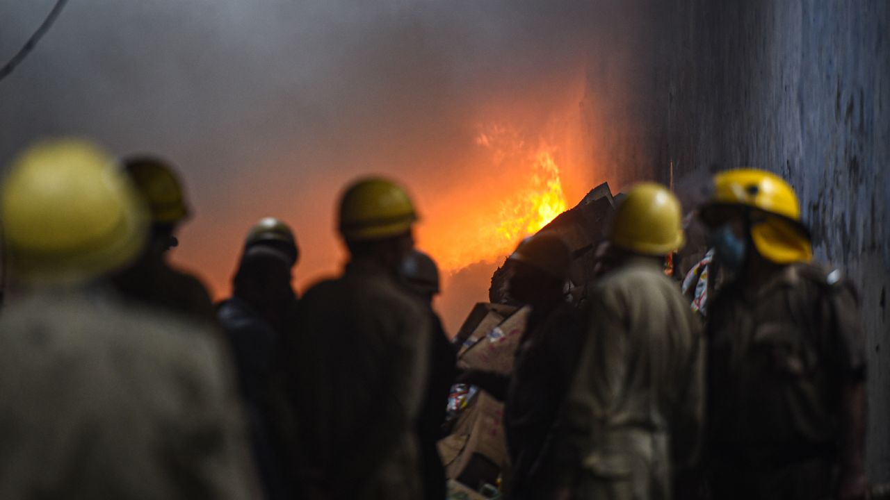 Firefighters try to control the fire that gutted a plastic factory in Mayapuri on September 16, 2021 in New Delhi, India.