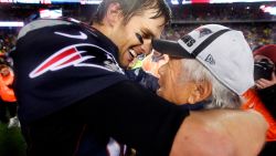 FOXBOROUGH, MA - JANUARY 18: Patriots quarterback Tom Brady is all smiles as he hugs team owner Robert Kraft after New England's romp over the Colts. The New England Patriots hosted the Indianapolis Colts in the AFC Championship Game at Gillette Stadium. (Photo by Jim Davis/The Boston Globe via Getty Images)
