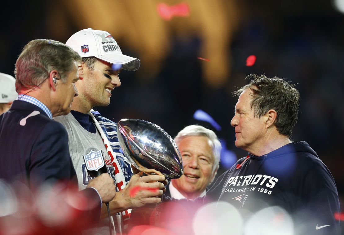 Brady, Kraft and Belichick celebrate with the Vince Lombardi Trophy after defeating the Seattle Seahawks to win Super Bowl XLIX on February 1, 2015.