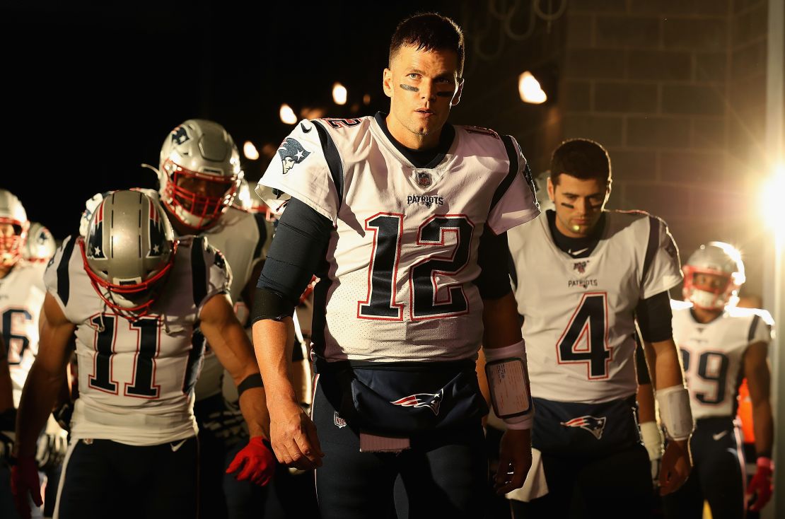 Brady leads his team onto the field before the game against the New York Jets at MetLife Stadium on October 21, 2019. 