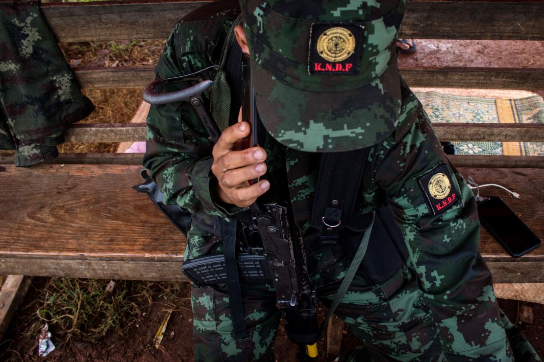 Members of the Karenni Nationalities Defense Force (KNDF) at a checkpoint near Demoso, in Myanmar's eastern Kayah state on October 19, 2021.