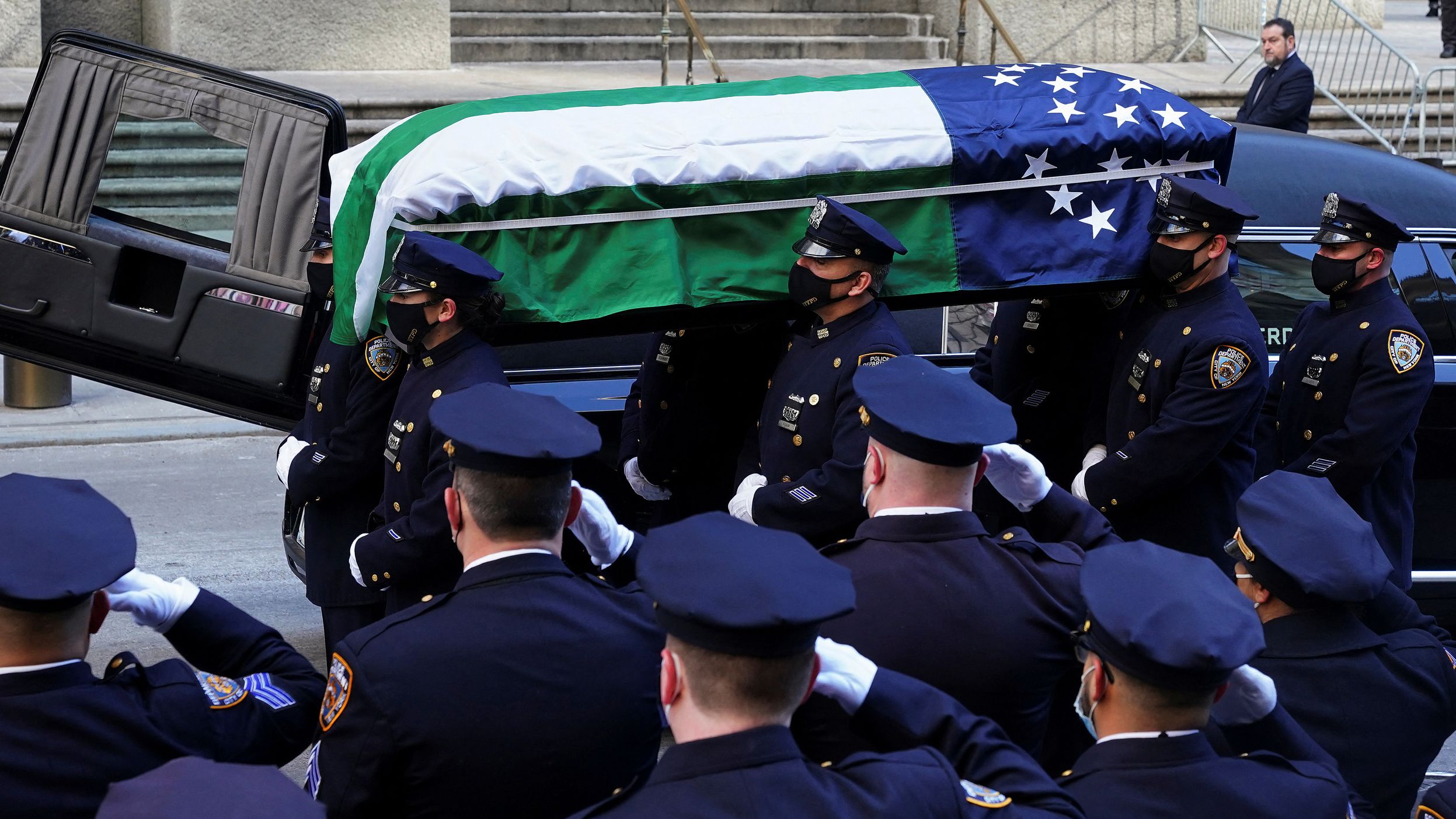 Rivera's casket is carried at his wake.