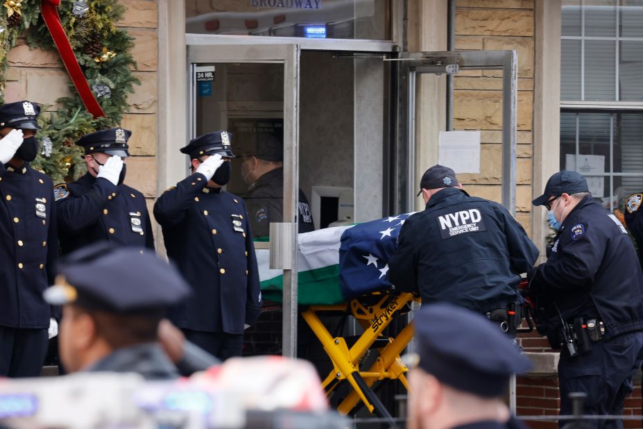 Rivera's body is brought into a funeral home on January 23.