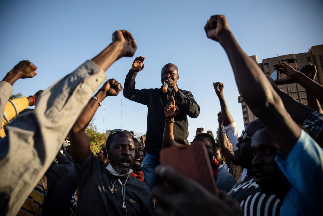Activist Mamadou Drabo announces to a crowd in Ouagadougou, Burkina Faso, that Lt. Col. Paul-Henri Damiba, a senior military officer, was now the African country's new leader on Monday, January 24. The crowd was showing support for <a href="https://www.cnn.com/2022/01/24/africa/military-detains-president-kabore-intl/index.html" target="_blank">the coup</a> that deposed President Roch Kabore and dissolved the government and parliament.