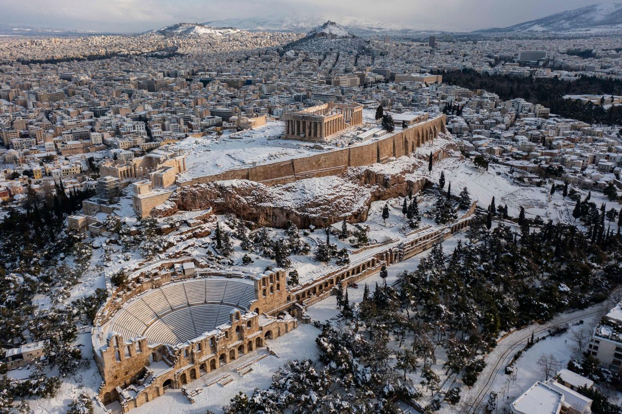 The Parthenon is seen atop the Acropolis after a heavy snowfall in Athens, Greece, on Tuesday, January 25.